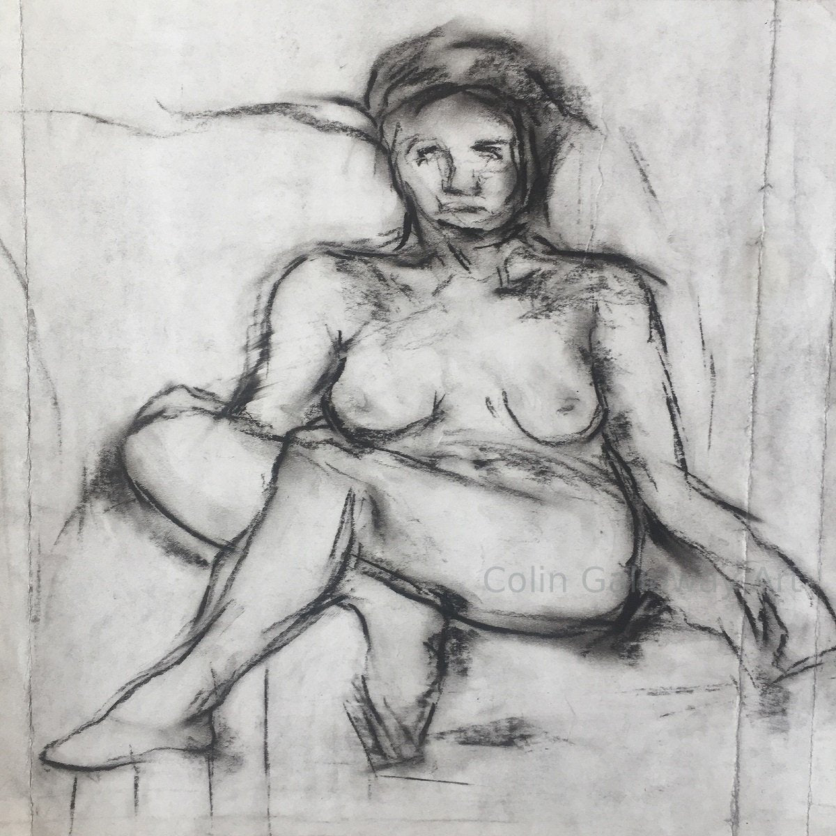  Charcoal life drawing by Colin Galloway of a nude woman facing forward, seated against cushions with crossed legs.