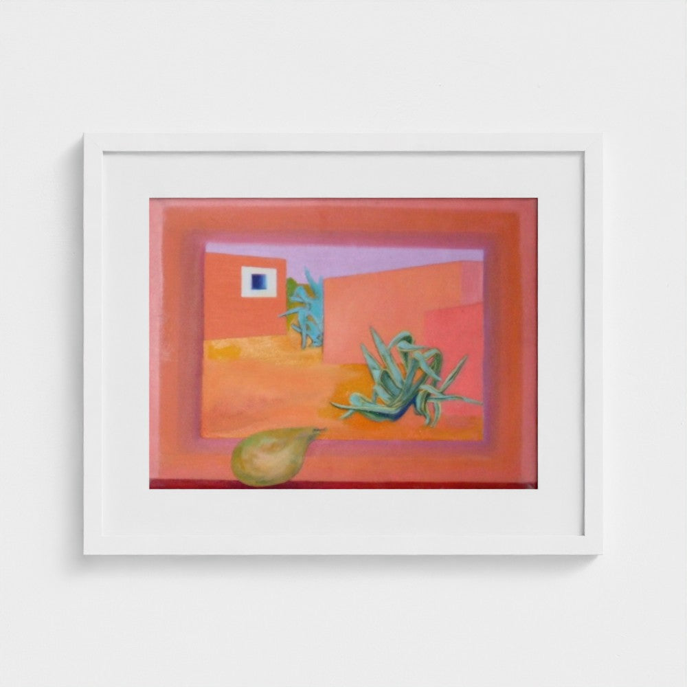 White-framed print of Colin Galloway’s Formentera finca, with coral walls, blue-green plants and a foreground pear.